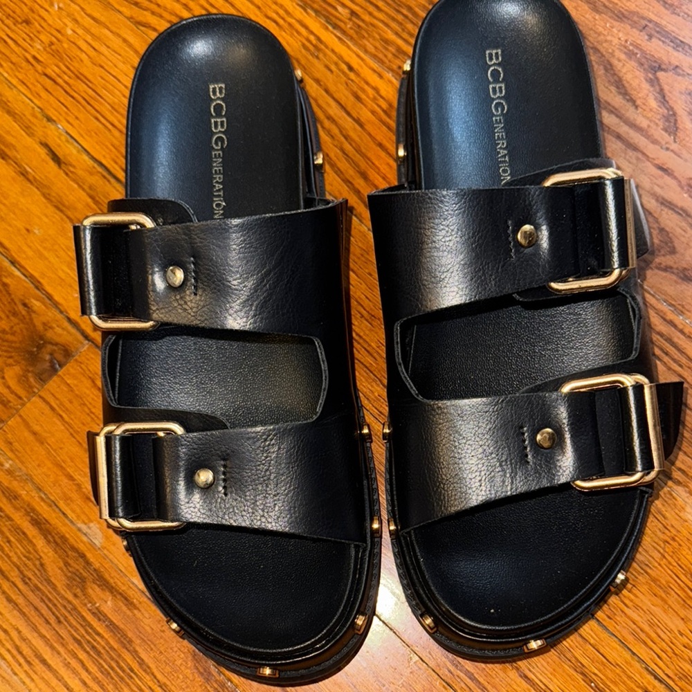 BCBGeneration Black Slides with Gold Buckles
